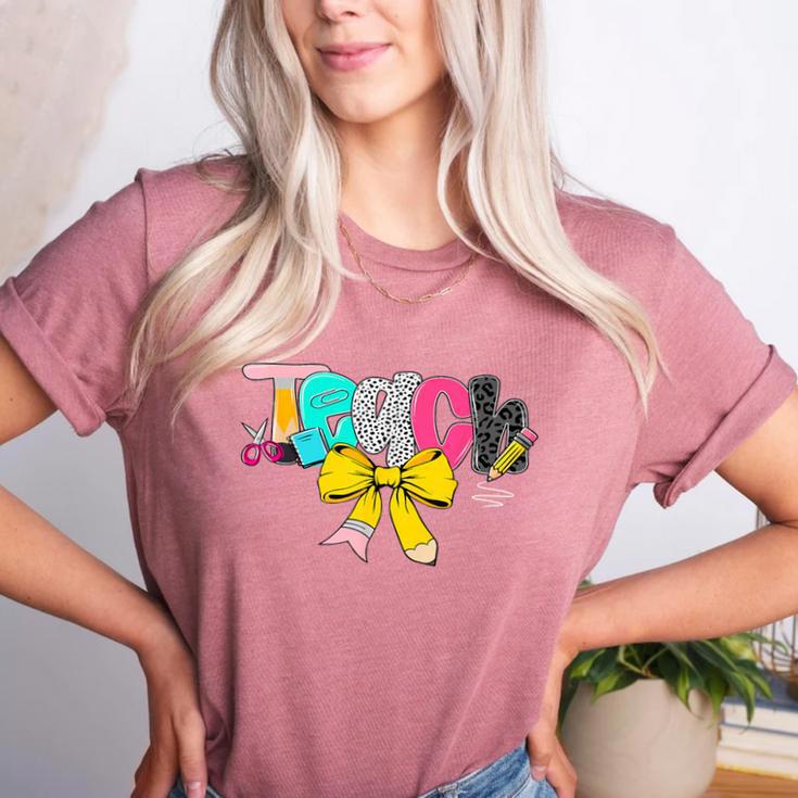 Teach Coquette Bow Teacher Back To School Happy First Day Women's Heather T-Shirt