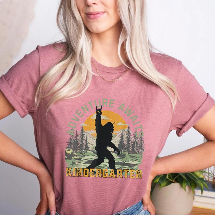 Adventure Awaits Bigfoot Teacher Kindergarten Back To School Women's Heather T-Shirt Adventure Awaits Bigfoot Teacher Kindergarten Back To School Women's Heather T-Shirt