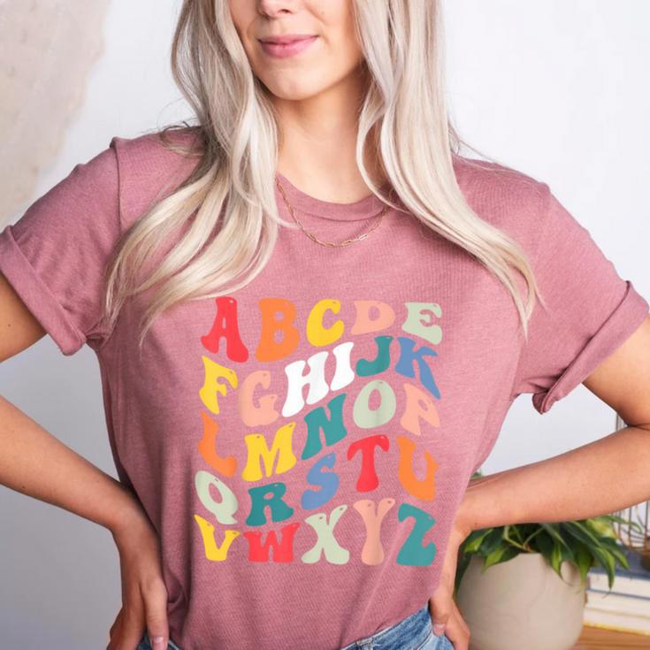 Alphabet Hi Back To School ABC Pre K Kindergarten Teacher Women's Heather T-Shirt Alphabet Hi Back To School ABC Pre K Kindergarten Teacher Women's Heather T-Shirt