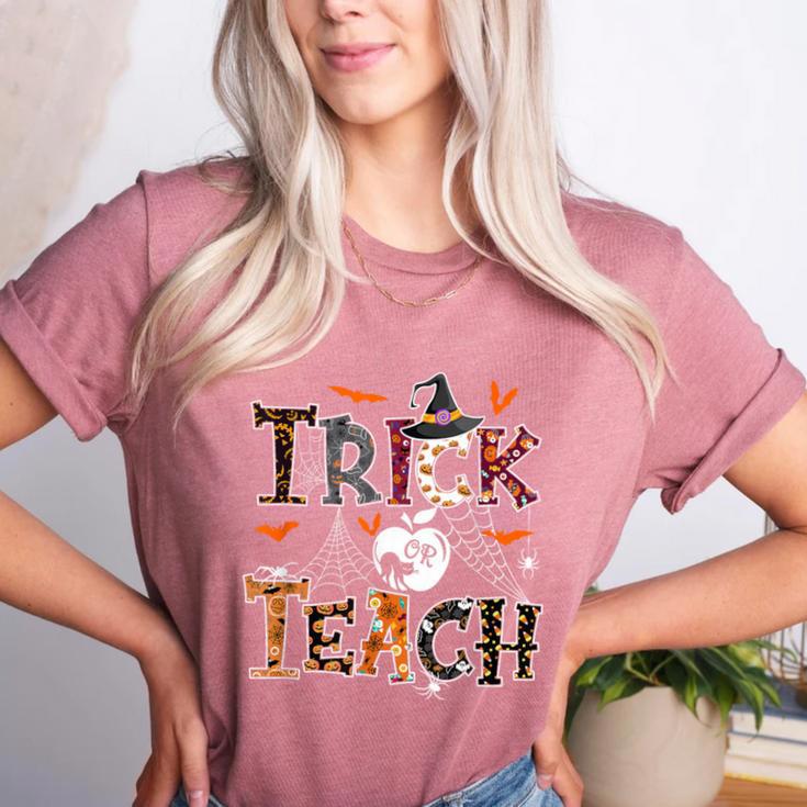 Fall Holiday Themed Thanksgiving Halloween Teacher Trick Or Women's Heather T-Shirt