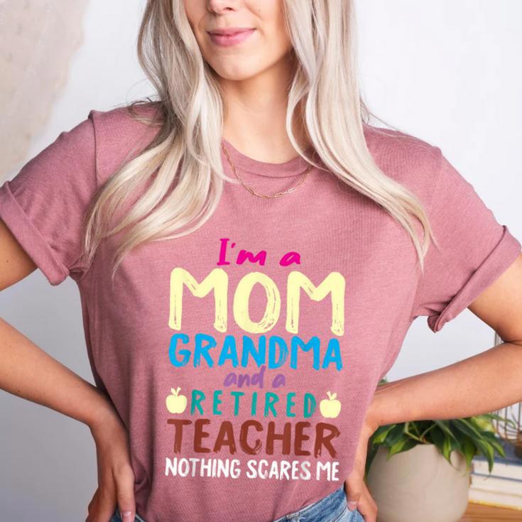 I'm Mom Grandma And A Retired Teacher Nothing Scares Me Men Women Women's Heather T-Shirt
