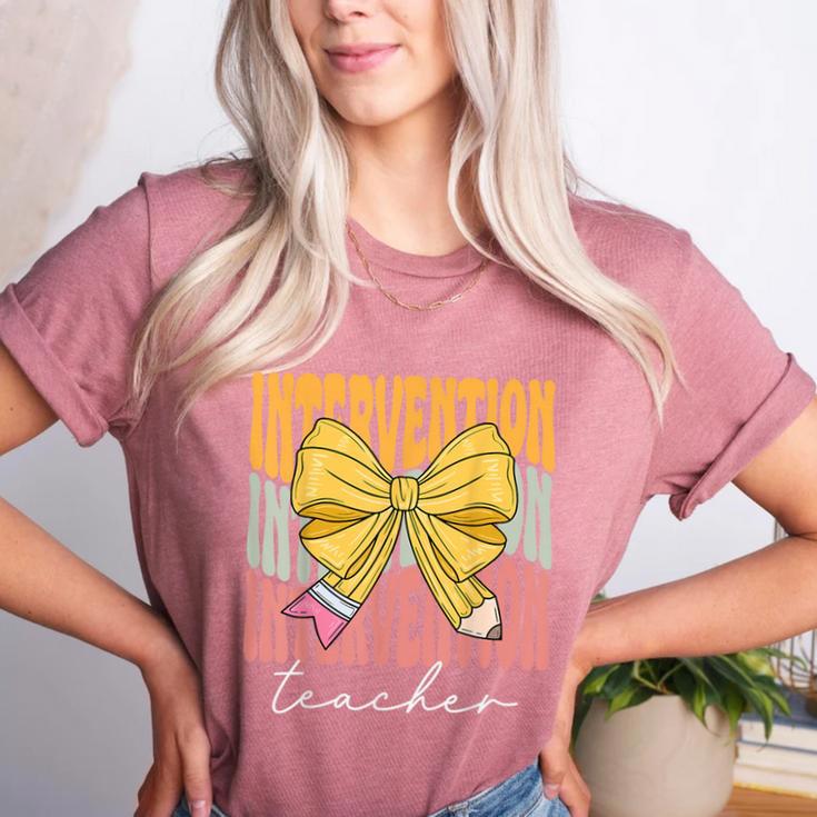Interventionist Teacher Groovy Coquette Bow Back To School Women's Heather T-Shirt Interventionist Teacher Groovy Coquette Bow Back To School Women's Heather T-Shirt