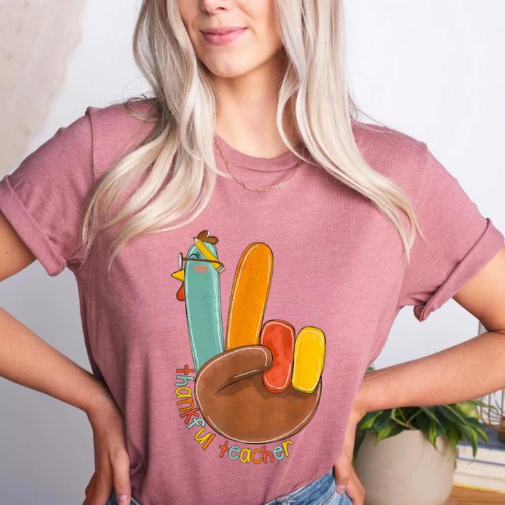 One Thankful Teacher Thanksgiving Turkey Peace Hand Sign Women's Heather T-Shirt One Thankful Teacher Thanksgiving Turkey Peace Hand Sign Women's Heather T-Shirt