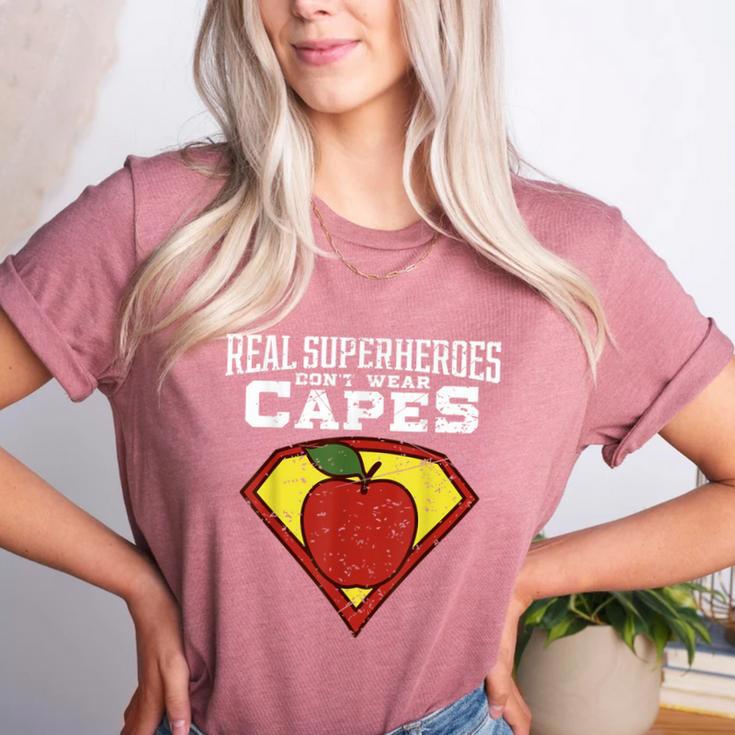 Real Superheroes Don't Wear Capes Teacher Shirt Teaching Te Women's Heather T-Shirt