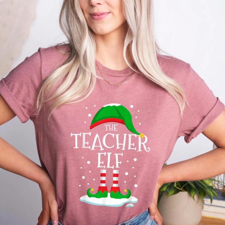 The Teacher Elf Christmas Family Matching Xmas Group For Men Women Women's Heather T-Shirt The Teacher Elf Christmas Family Matching Xmas Group For Men Women Women's Heather T-Shirt
