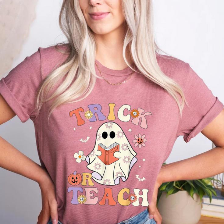 Teacher Halloween Trick Or Teach Floral Ghost Women's Heather T-Shirt Teacher Halloween Trick Or Teach Floral Ghost Women's Heather T-Shirt