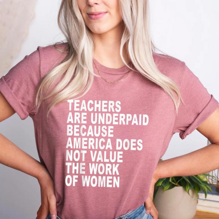 Teachers Are Underpaid Because America Does Not Value Men Women Women's Heather T-Shirt Teachers Are Underpaid Because America Does Not Value Men Women Women's Heather T-Shirt