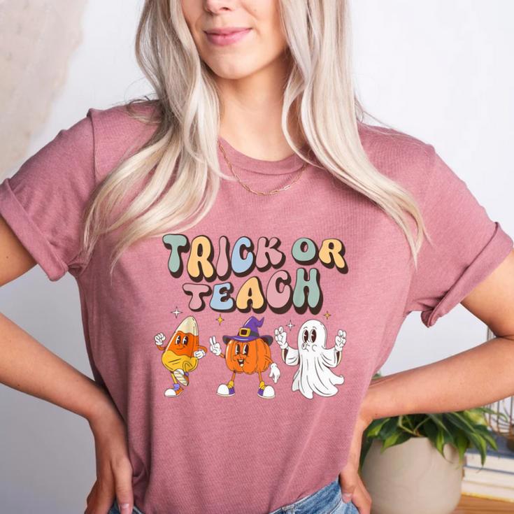Trick Or Teach Candy Corn Pumpkin Ghost Teacher Women's Heather T-Shirt