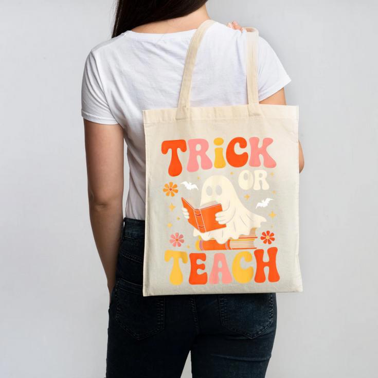 Trick Or Teach Halloween Shirt For Teacher Kids Floral Ghost Canvas Tote Bag