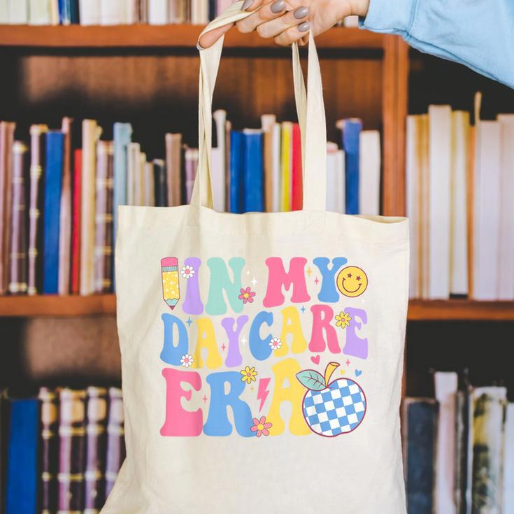 In My Daycare Era Groovy Teacher Daycare First Day Of School Canvas Tote Bag, Groovy Teacher Tote Bags, funny gift In My Daycare Era Groovy Teacher Daycare First Day Of School Canvas Tote Bag, Groovy Teacher Tote Bags, funny gift
