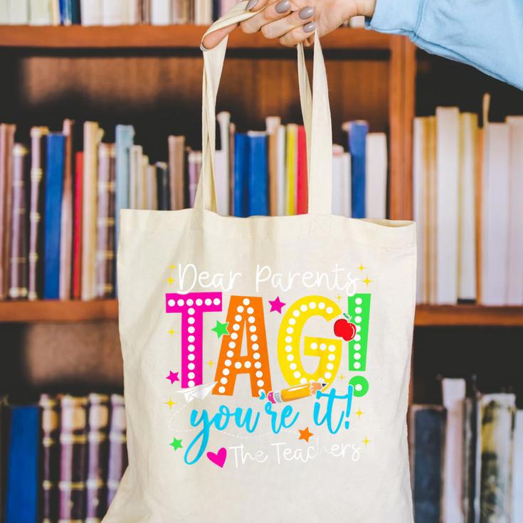 Dear Parents Tag You'Re It Love Teachers Last Day Of School Canvas Tote Bag, funny gift Dear Parents Tag You'Re It Love Teachers Last Day Of School Canvas Tote Bag, funny gift