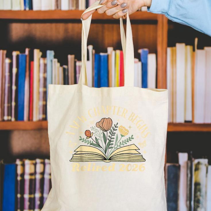 A New Chapter Begins Retired 2026 Teacher Retirement Canvas Tote Bag, funny gift A New Chapter Begins Retired 2026 Teacher Retirement Canvas Tote Bag, funny gift