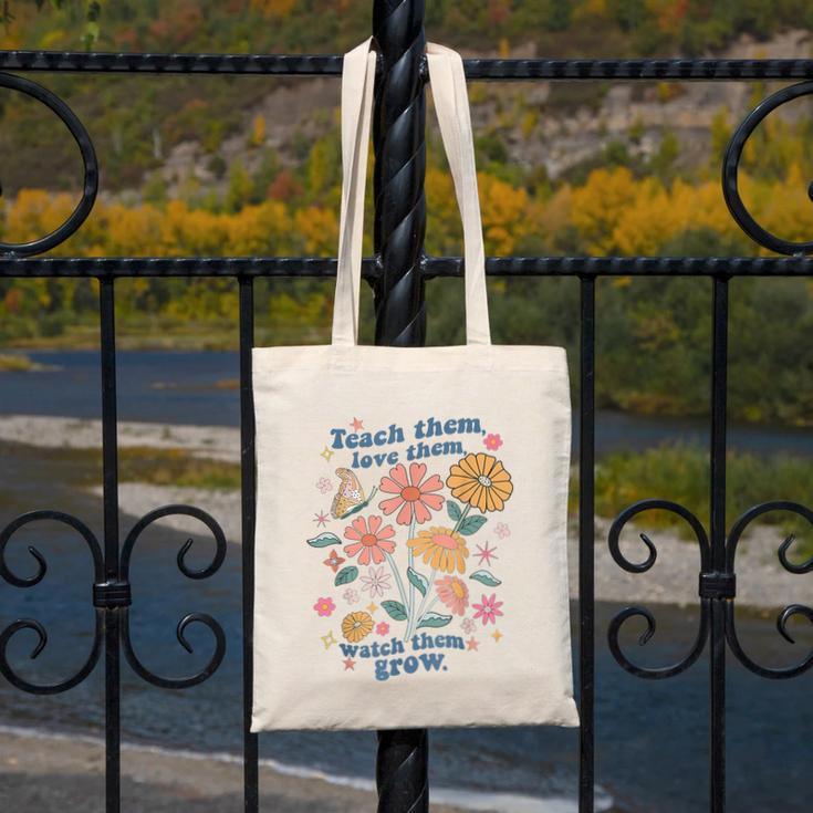 Teach Them Love Them Watch Them Grow Retro Teacher Floral Canvas Tote Bag, funny design