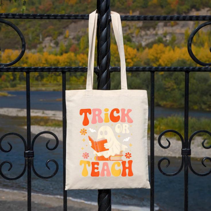 Trick Or Teach Halloween Shirt For Teacher Kids Floral Ghost Canvas Tote Bag, funny design