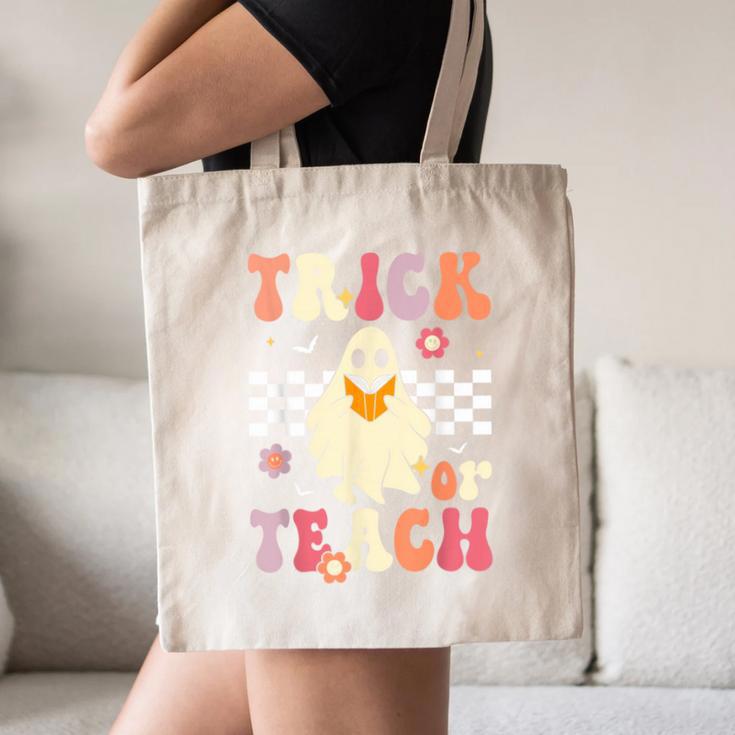 Groovy Teacher Halloween Retro Trick Or Teach Floral Ghost Canvas Tote Bag, novelty gifts, funny gifts Groovy Teacher Halloween Retro Trick Or Teach Floral Ghost Canvas Tote Bag, novelty gifts, funny gifts
