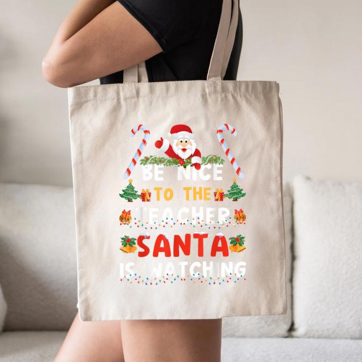 Be Nice To The Teacher Santa Is Watching Christmas Canvas Tote Bag, novelty gifts, funny gifts Be Nice To The Teacher Santa Is Watching Christmas Canvas Tote Bag, novelty gifts, funny gifts