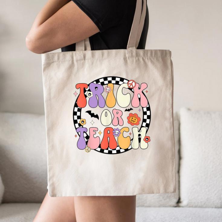 Trick Or Teach Retro Groovy Halloween Teacher Canvas Tote Bag, novelty gifts, funny gifts Trick Or Teach Retro Groovy Halloween Teacher Canvas Tote Bag, novelty gifts, funny gifts