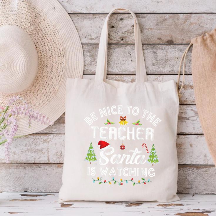 Christmas Be Nice To The Teacher Santa Is Watching Xmas Canvas Tote Bag, gift for family, gift for coworker Christmas Be Nice To The Teacher Santa Is Watching Xmas Canvas Tote Bag, gift for family, gift for coworker