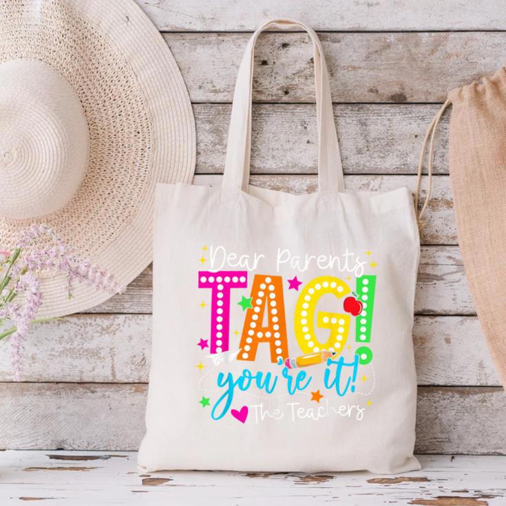 Dear Parents Tag You'Re It Love Teachers Last Day Of School Canvas Tote Bag, gift for family, gift for coworker Dear Parents Tag You'Re It Love Teachers Last Day Of School Canvas Tote Bag, gift for family, gift for coworker