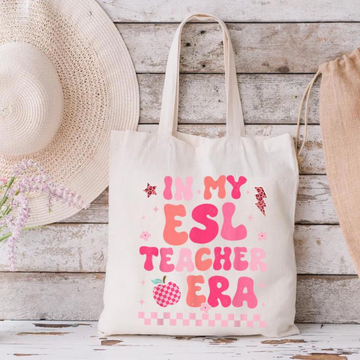 In My Esl Teacher Era Back To School ESL Teacher Groovy Canvas Tote Bag, Esl Teacher Tote Bags, Groovy Teacher Tote Bags, gift for family, gift for coworker In My Esl Teacher Era Back To School ESL Teacher Groovy Canvas Tote Bag, Esl Teacher Tote Bags, Groovy Teacher Tote Bags, gift for family, gift for coworker