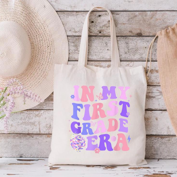 In My First Grade Era 1st Grade Girls Teacher Back To School Canvas Tote Bag, First Grade Teacher Tote Bags, gift for family, gift for coworker In My First Grade Era 1st Grade Girls Teacher Back To School Canvas Tote Bag, First Grade Teacher Tote Bags, gift for family, gift for coworker