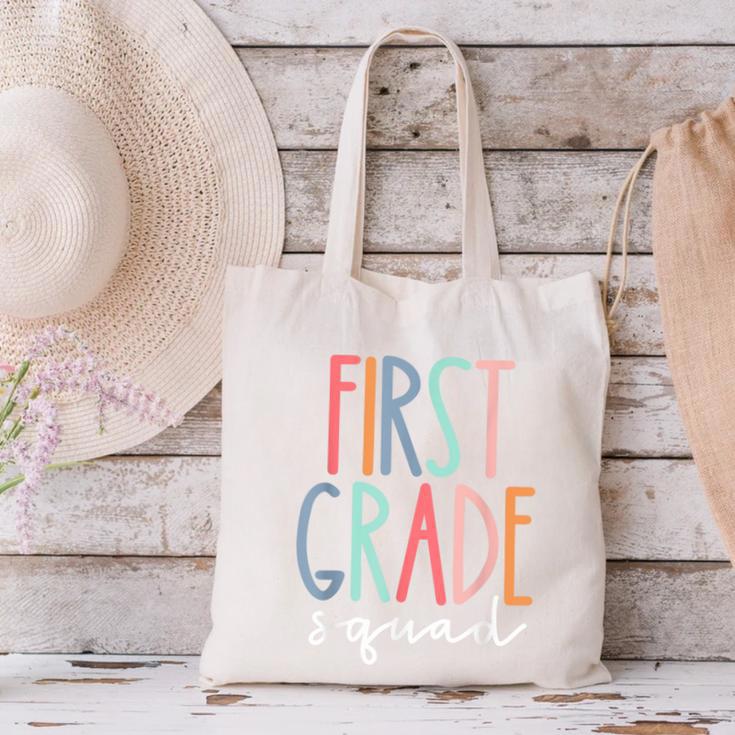 First Grade Squad 1st Grade Teacher Crew Back To School Team Canvas Tote Bag, First Grade Teacher Tote Bags, gift for family, gift for coworker First Grade Squad 1st Grade Teacher Crew Back To School Team Canvas Tote Bag, First Grade Teacher Tote Bags, gift for family, gift for coworker