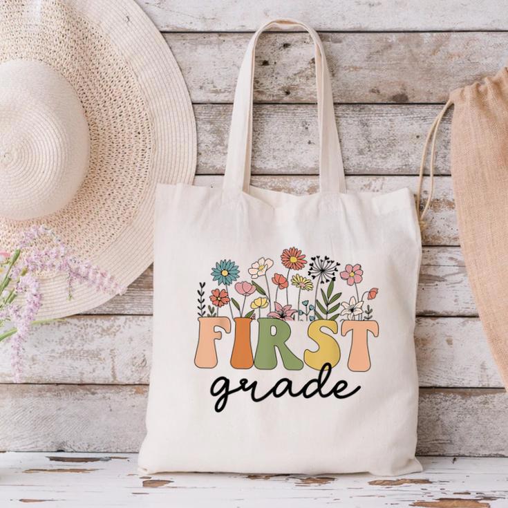First Grade Teacher Wildflower Back To School Floral Outfits Canvas Tote Bag, First Grade Teacher Tote Bags, gift for family, gift for coworker