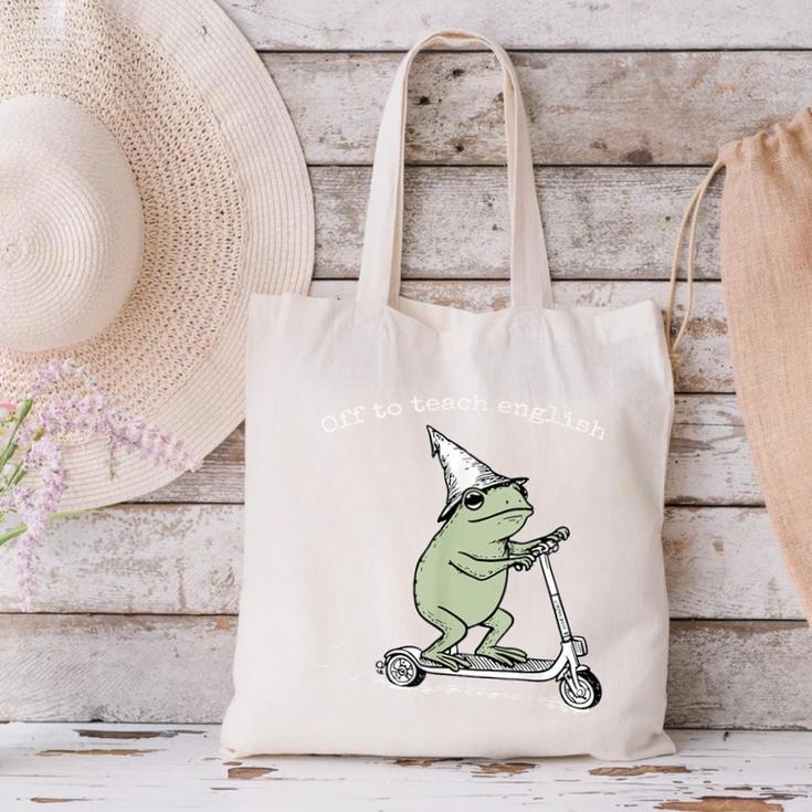 Off To Teach English Scooter Frog ESL Teacher Literature Canvas Tote Bag, Esl Teacher Tote Bags, English Teacher Tote Bags, gift for family, gift for coworker Off To Teach English Scooter Frog ESL Teacher Literature Canvas Tote Bag, Esl Teacher Tote Bags, English Teacher Tote Bags, gift for family, gift for coworker