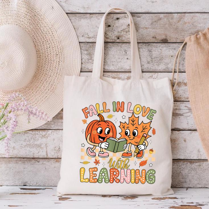 Retro Fall In Love With Learning Autumn Pumpkin Teacher Kids Canvas Tote Bag, gift for family, gift for coworker Retro Fall In Love With Learning Autumn Pumpkin Teacher Kids Canvas Tote Bag, gift for family, gift for coworker