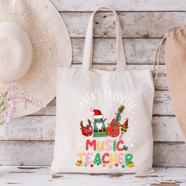 Santa's Favorite Music Teacher Christmas Santa Hat Matching Canvas Tote Bag, gift for family, gift for coworker Santa's Favorite Music Teacher Christmas Santa Hat Matching Canvas Tote Bag, gift for family, gift for coworker