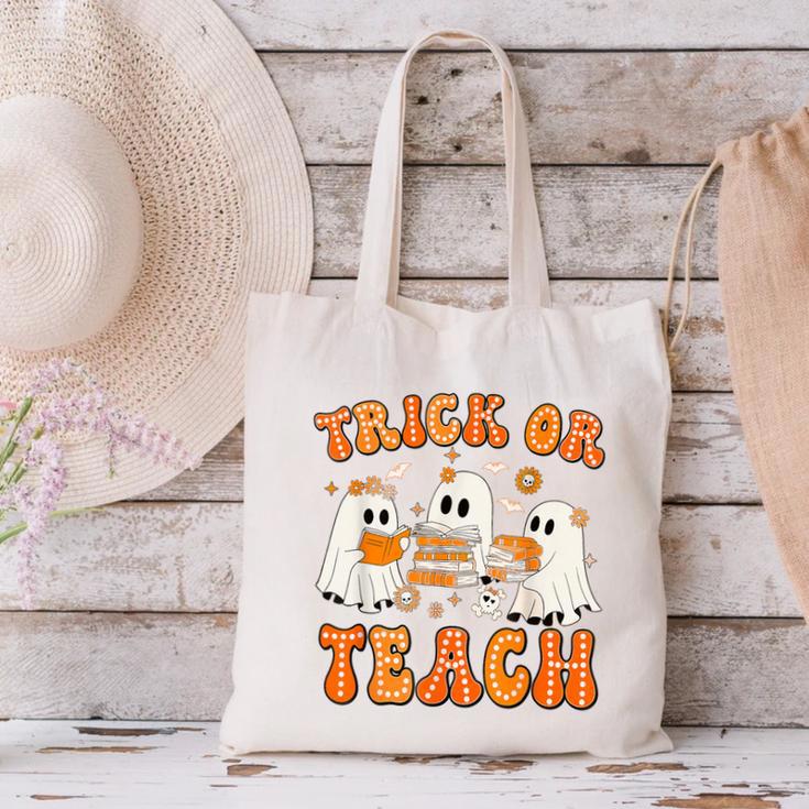 Teacher Halloween Trick Or Teach Retro Groovy Floral Ghost Canvas Tote Bag, Groovy Teacher Tote Bags, gift for family, gift for coworker Teacher Halloween Trick Or Teach Retro Groovy Floral Ghost Canvas Tote Bag, Groovy Teacher Tote Bags, gift for family, gift for coworker