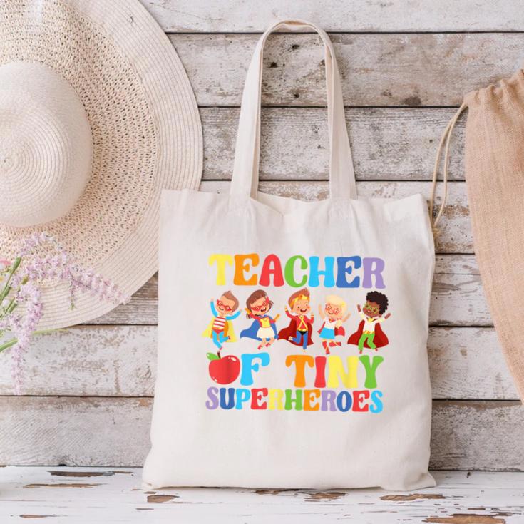 Teacher Of Tiny Superheroes Teach 100th Day Of School Canvas Tote Bag, gift for family, gift for coworker Teacher Of Tiny Superheroes Teach 100th Day Of School Canvas Tote Bag, gift for family, gift for coworker