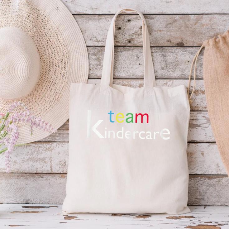 Team Kindercare Teacher Back To School Shirt T-Shirt Canvas Tote Bag, gift for family, gift for coworker Team Kindercare Teacher Back To School Shirt T-Shirt Canvas Tote Bag, gift for family, gift for coworker