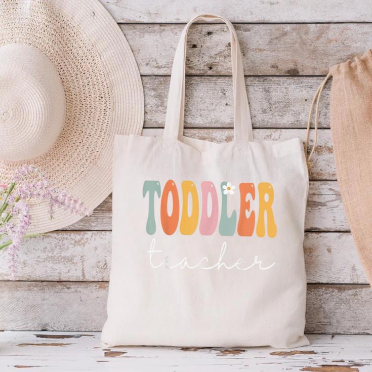Toddler Teacher Retro Groovy Women Happy First Day Of School Canvas Tote Bag, Groovy Teacher Tote Bags, gift for family, gift for coworker Toddler Teacher Retro Groovy Women Happy First Day Of School Canvas Tote Bag, Groovy Teacher Tote Bags, gift for family, gift for coworker