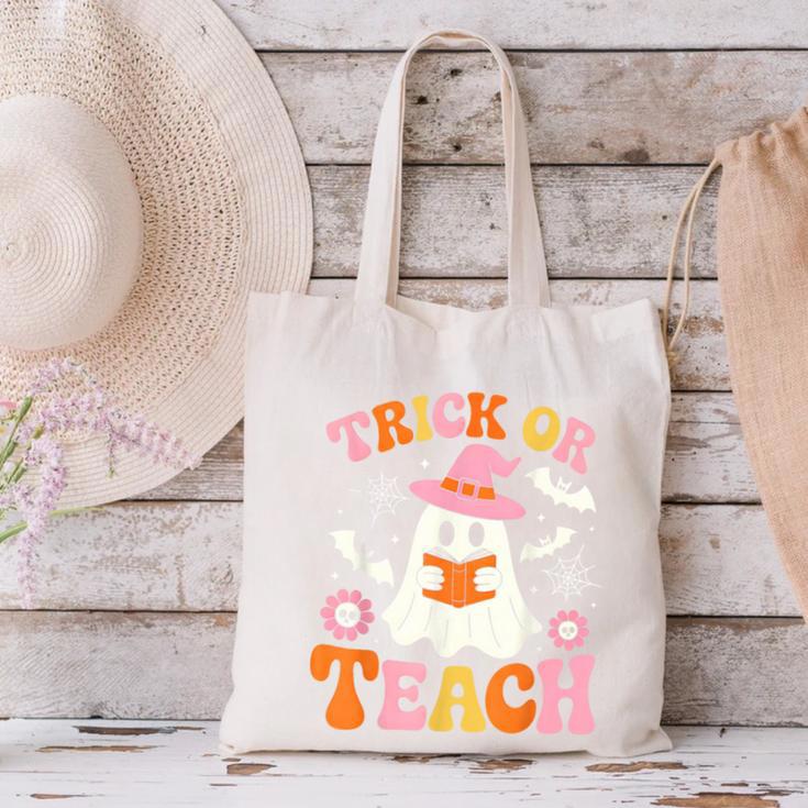 Trick Or Teach Cute Floral Ghost Teacher Halloween Costume Canvas Tote Bag, gift for family, gift for coworker Trick Or Teach Cute Floral Ghost Teacher Halloween Costume Canvas Tote Bag, gift for family, gift for coworker