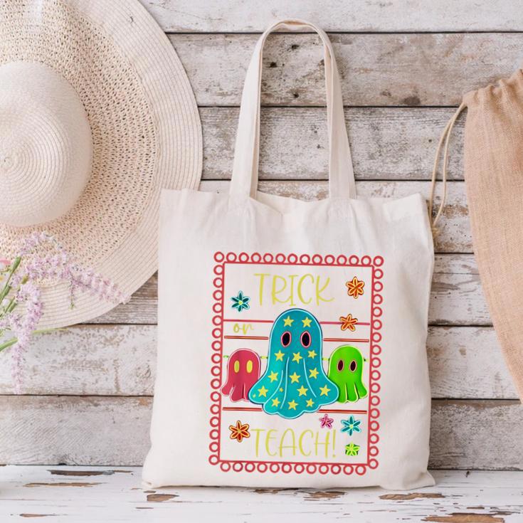 Trick Or Teach Neon Ghost Flower Teacher Spooky Halloween Canvas Tote Bag, gift for family, gift for coworker Trick Or Teach Neon Ghost Flower Teacher Spooky Halloween Canvas Tote Bag, gift for family, gift for coworker