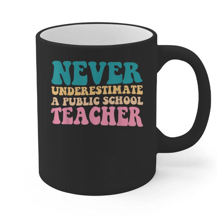 Never Underestimate A Public School Teacher Groovy Women Graphic Print Coffee Mug