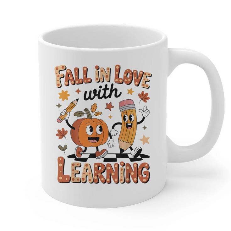 Retro Fall In Love With Learning Autumn Pumpkin Teacher Kids Graphic Print Coffee Mug