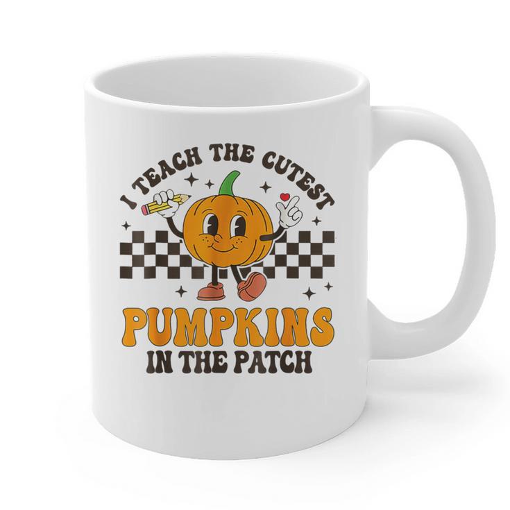 I Teach The Cutest Pumpkins In The Patch Groovy Teacher Fall Graphic Print Coffee Mug
