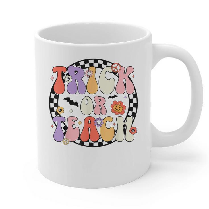 Trick Or Teach Retro Groovy Halloween Teacher Graphic Print Coffee Mug