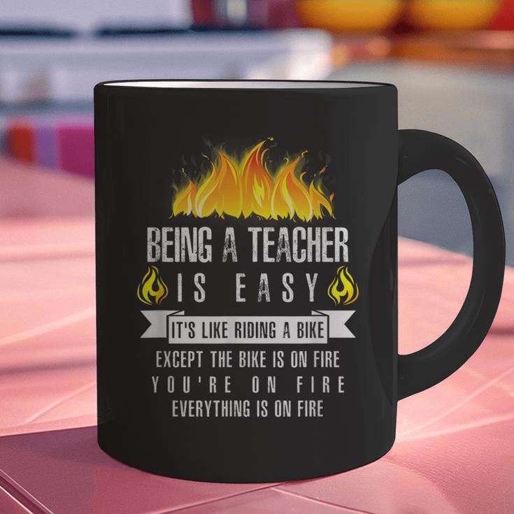 Being a Teacher Is Easy Everything Is On Fire T-Shirt For Men Women Kids Graphic Print Coffee Mug, gift for family, gift for coworker Being a Teacher Is Easy Everything Is On Fire T-Shirt For Men Women Kids Graphic Print Coffee Mug, gift for family, gift for coworker
