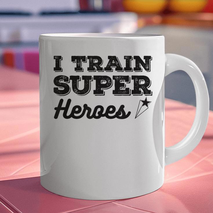 I Train Superheroes For Teacher Coach Men Women Graphic Print Coffee Mug, gift for family, gift for coworker I Train Superheroes For Teacher Coach Men Women Graphic Print Coffee Mug, gift for family, gift for coworker