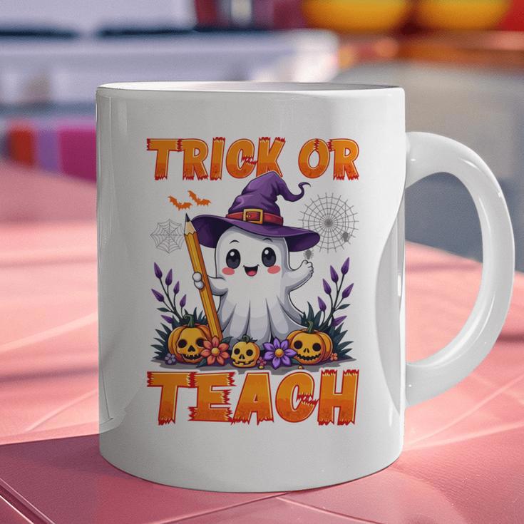 Trick Or Teach Teacher Halloween Ghost Pencil Floral Graphic Print Coffee Mug, gift for family, gift for coworker Trick Or Teach Teacher Halloween Ghost Pencil Floral Graphic Print Coffee Mug, gift for family, gift for coworker