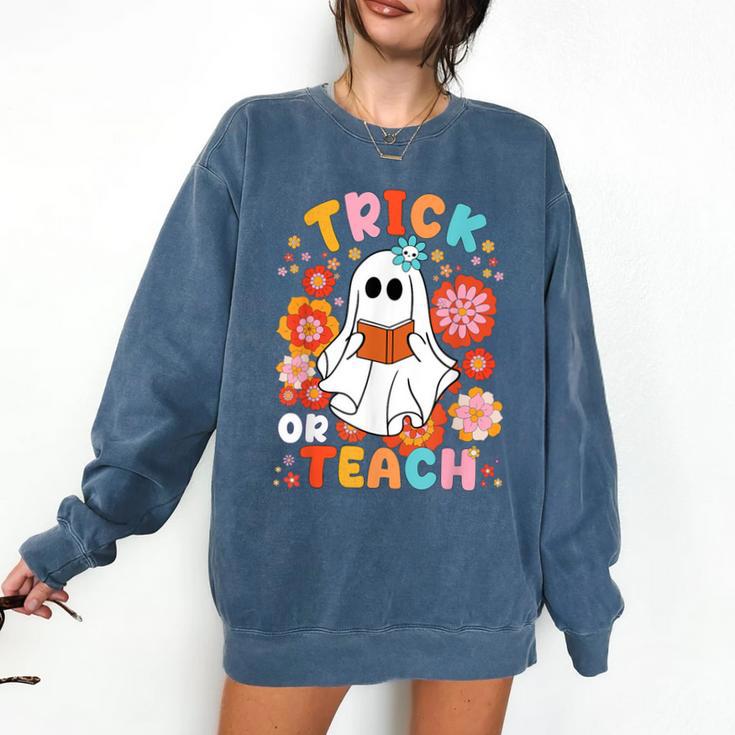 Groovy Halloween Trick Or Teach Retro Floral Ghost Teacher For Men Women Kids Comfort Colors Sweatshirt Groovy Halloween Trick Or Teach Retro Floral Ghost Teacher For Men Women Kids Comfort Colors Sweatshirt