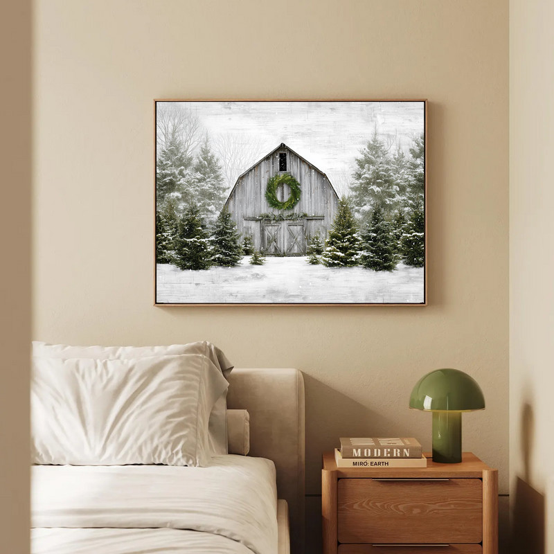 Winter farmhouse Christmas canvas wall art of a snowy barn and pine grove, rustic tones suited for entryway styling