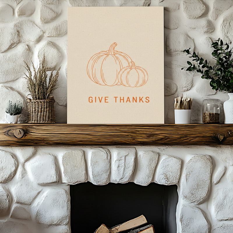 Give Thanks minimalist pumpkin wall art canvas in portrait orientation, soft terracotta hues and crisp lettering for hallway