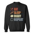 食べる寝るラグビーリピートラグビーコーチチームスポーツ スウェットシャツ