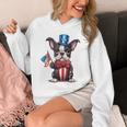 Boston Terrier Puppy Dog Holds His American Flag 4th Of July Unisex Hoodie, American Boston Terrier Gifts, Boston Terrier 4th Of July Gifts, funny design