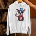 Boston Terrier Puppy Dog Holds His American Flag 4th Of July Women's Hoodie, American Boston Terrier Hoodies, Boston Terrier 4th Of July Hoodies, gift for family, gift for coworker