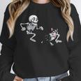 Skeleton Chasing Dog Boston Terrier Halloween Pet Lover Unisex Sweatshirt, novelty gifts, funny gifts